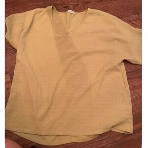 Elegant V-Neck Blouse in Soft Yellow